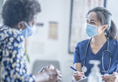 Bupa Cromwell – image of clinician and patient talking