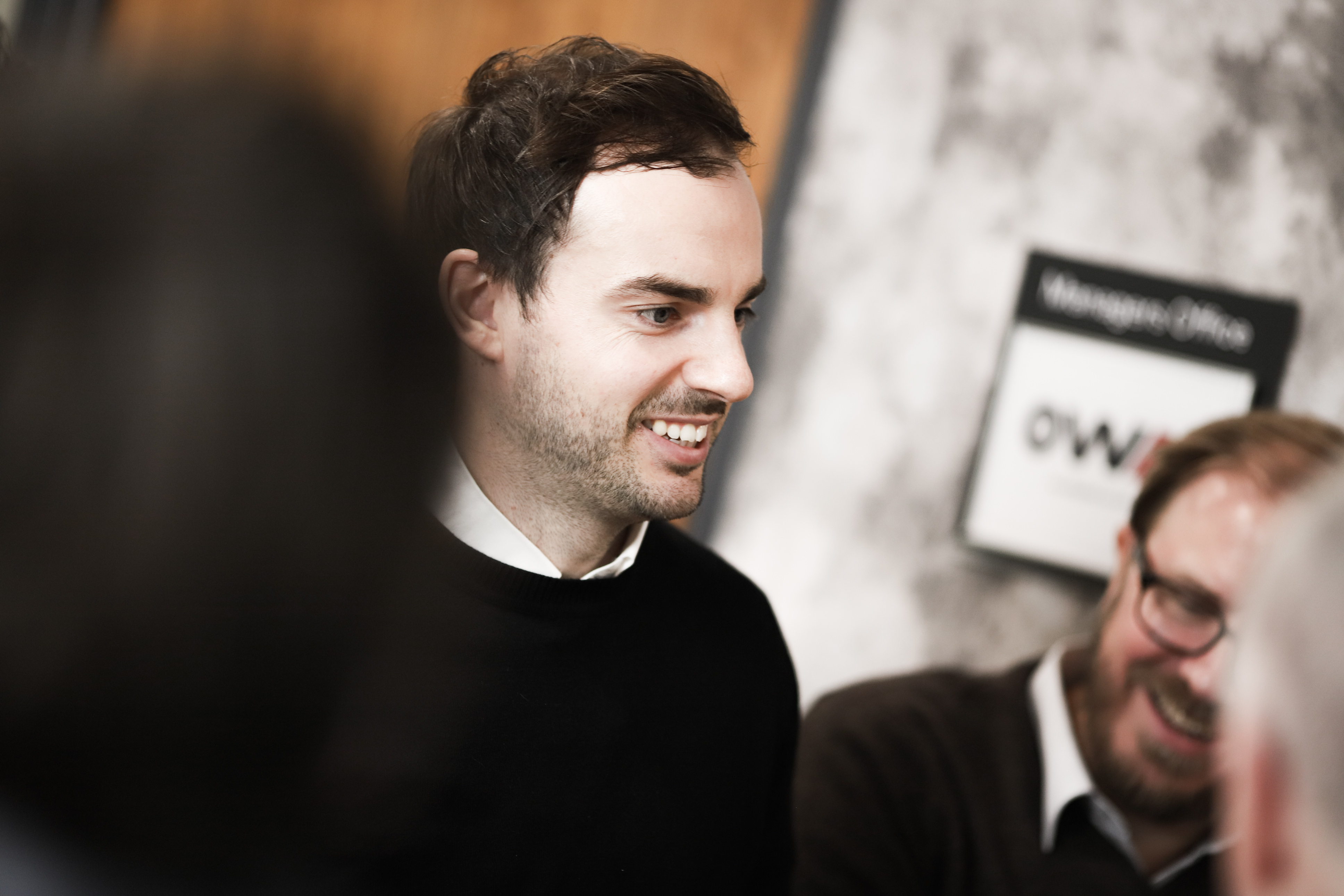 OWA team receiving UX design feedback from a client