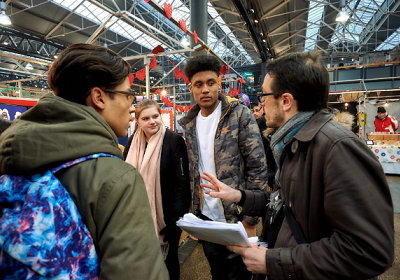 YE Trading Station - image of teenagers talking