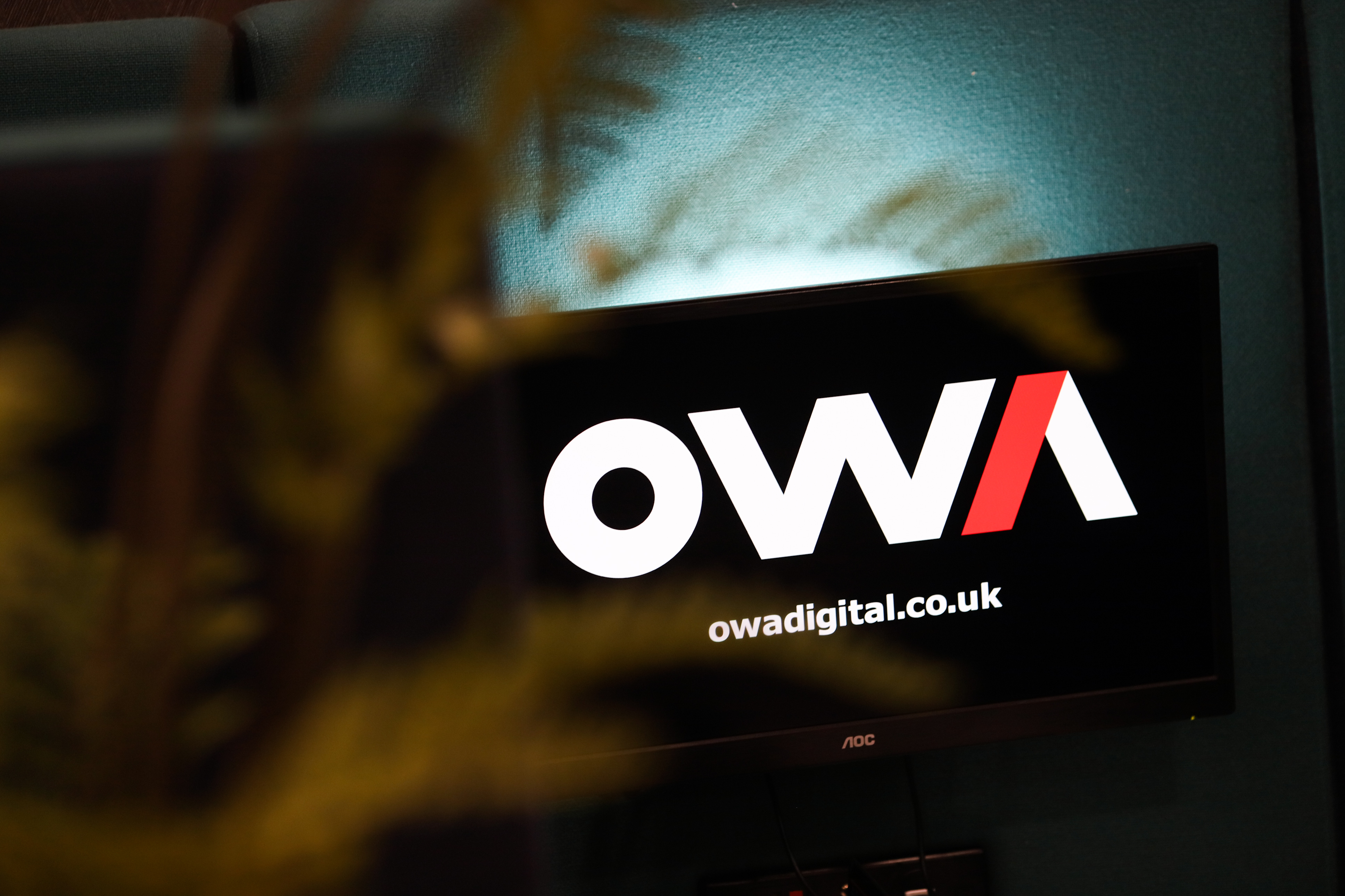 OWA logo on a monitor screen