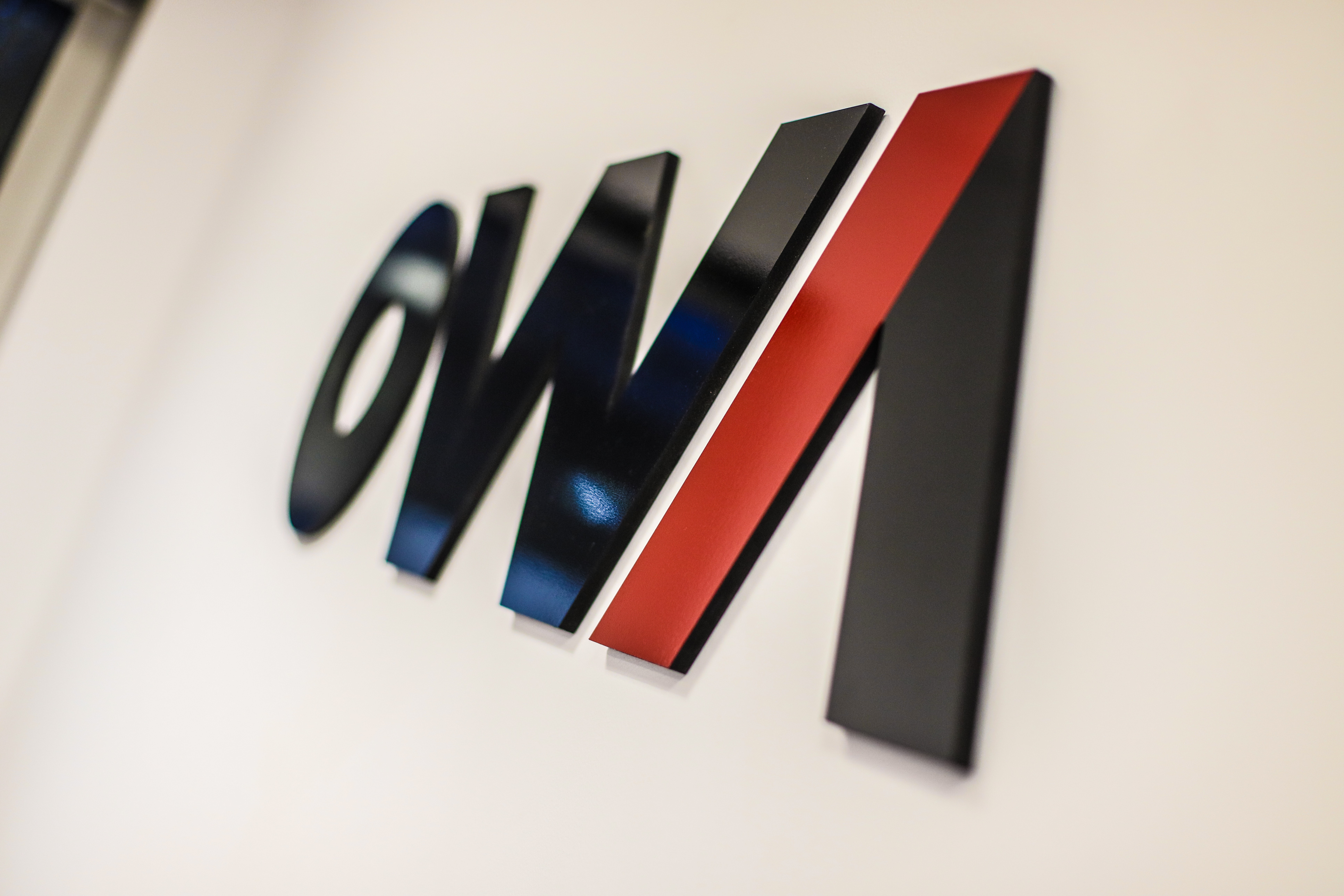 OWA logo on wall of office
