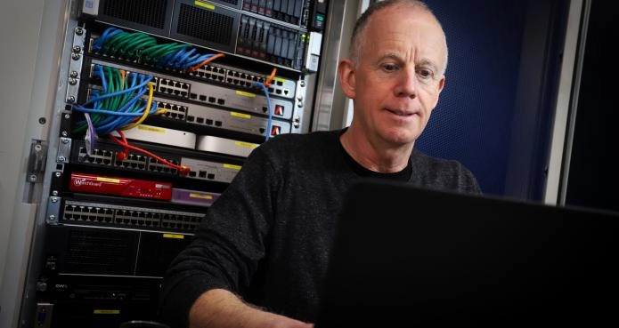 Secure legacy system support at hosting facility