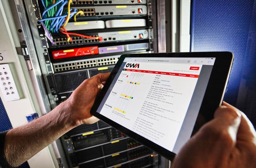 OWA team member checking client tablet app hosting