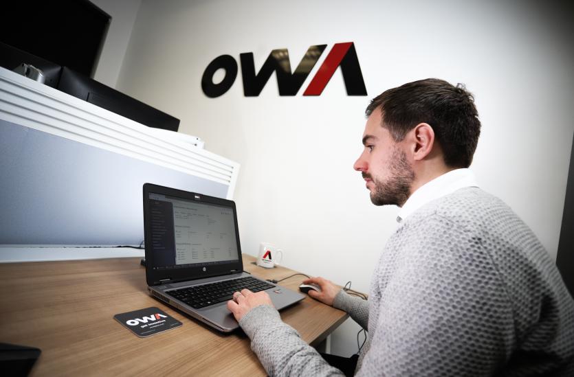 OWA team member reviewing hosting security protocols