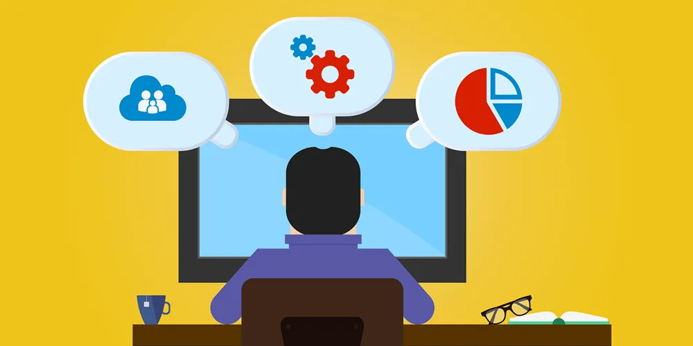 A person at a desk with a computer screen, featuring icons above, representing Legacy System Support